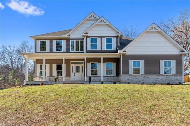 craftsman-style house with covered porch and a front lawn