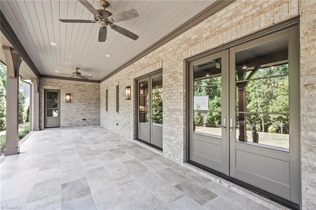 view of patio / terrace featuring ceiling fan and french doors