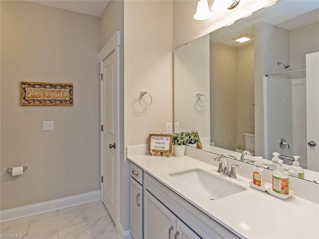 bathroom with marble finish floor, toilet, a shower, and baseboards