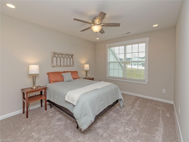 carpeted bedroom featuring visible vents, recessed lighting, a ceiling fan, and baseboards