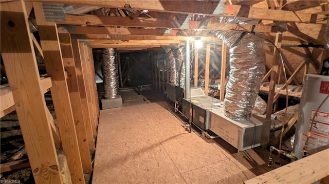 unfinished attic with gas water heater