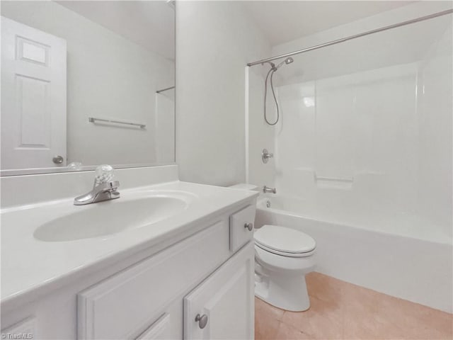 bathroom featuring vanity, toilet, bathtub / shower combination, and tile patterned flooring