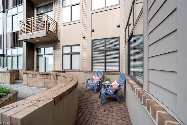 view of patio / terrace with a balcony