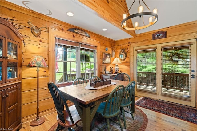 201 Cherokee Cir, Jefferson, NC 28640 - dining area with wooden walls, a chandelier, light wood-style floors, and recessed lighting