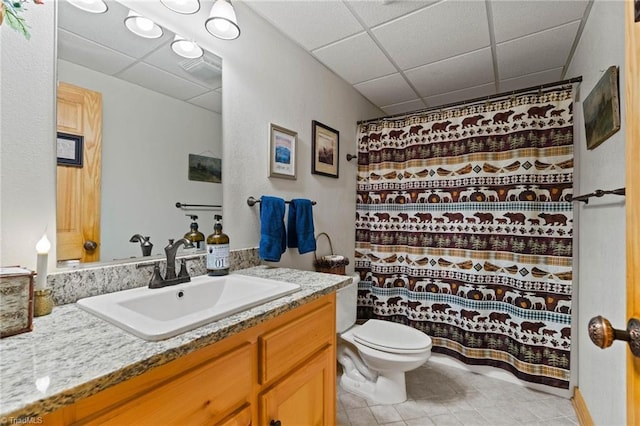 201 Cherokee Cir, Jefferson, NC 28640 - bathroom featuring a drop ceiling, vanity, toilet, tile patterned floors, and curtained shower