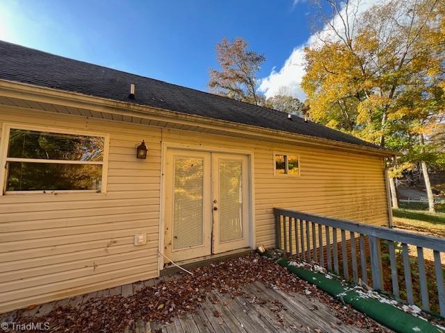 exterior space featuring a wooden deck