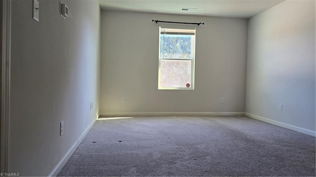 spare room with carpet flooring