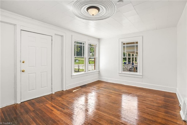 unfurnished room featuring hardwood / wood-style floors