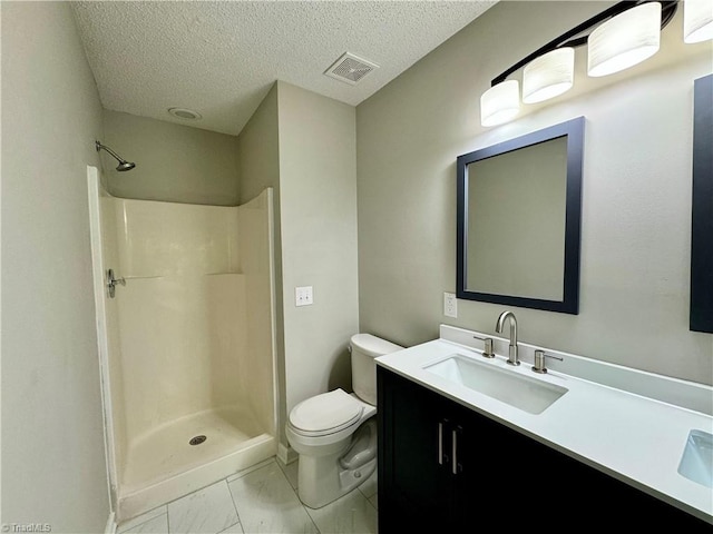 full bathroom featuring marble look tile flooring, toilet, a shower, vanity, and a textured ceiling