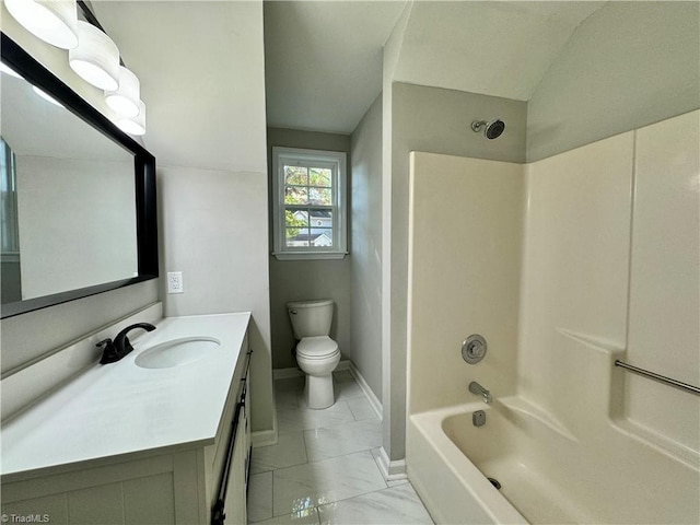 full bath with vanity, marble finish floors, toilet, shower / bathtub combination, and baseboards