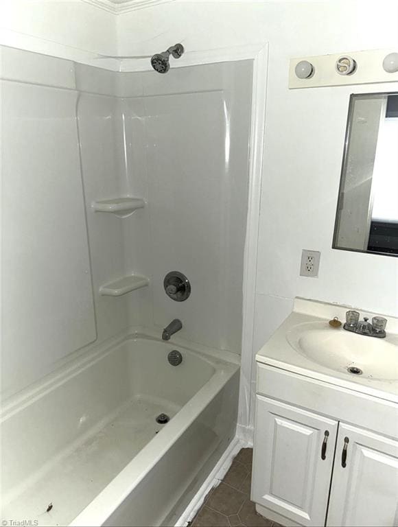 bathroom with vanity, tile patterned floors, and shower / bathtub combination