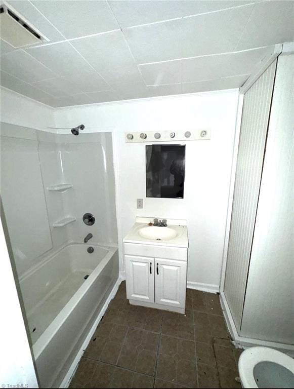 full bathroom with toilet,  shower combination, and vanity