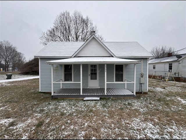 view of front of home featuring covered porch