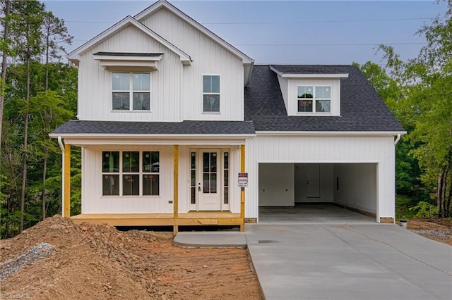 275 Greenturf Dr, Winston-Salem, NC 27107 - modern inspired farmhouse with concrete driveway, roof with shingles, and a garage