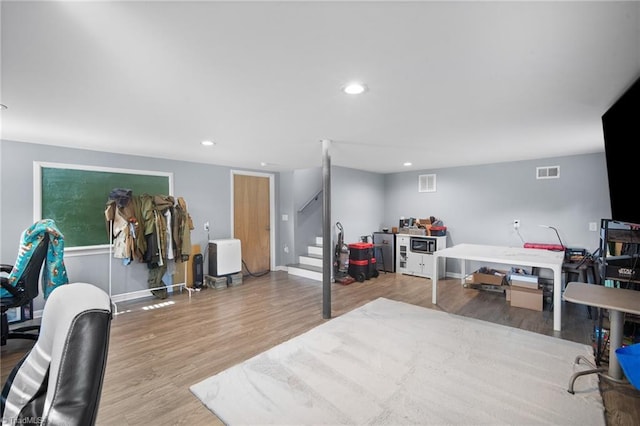 home office featuring recessed lighting, visible vents, and wood finished floors
