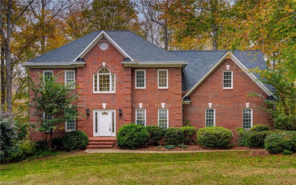 colonial house with a front lawn