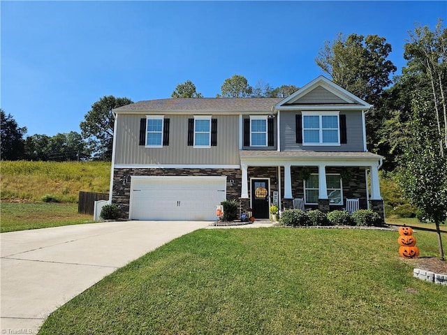 craftsman-style home with a garage, a porch, and a front lawn