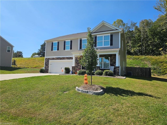 view of front of house with a front lawn and a garage