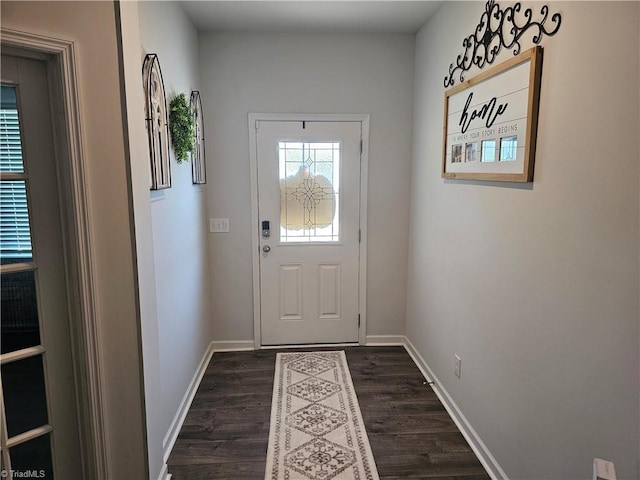 doorway to outside with dark hardwood / wood-style flooring