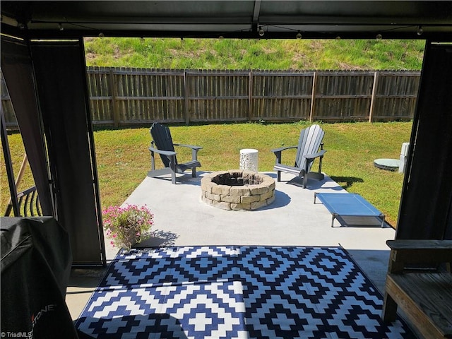 view of patio / terrace with a fire pit