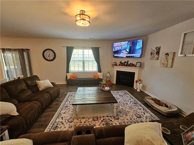 living room featuring dark hardwood / wood-style floors