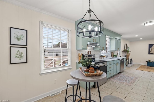 kitchen with visible vents, under cabinet range hood, decorative backsplash, appliances with stainless steel finishes, and a sink