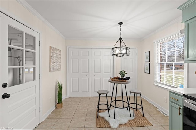 dining area featuring light tile patterned flooring, baseboards, and ornamental molding