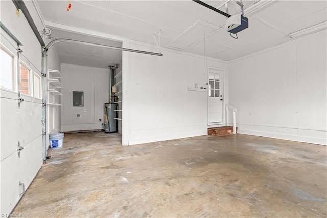 garage with gas water heater, electric panel, and a garage door opener