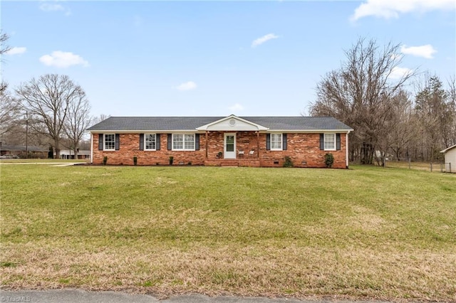 ranch-style home featuring crawl space, brick siding, and a front lawn