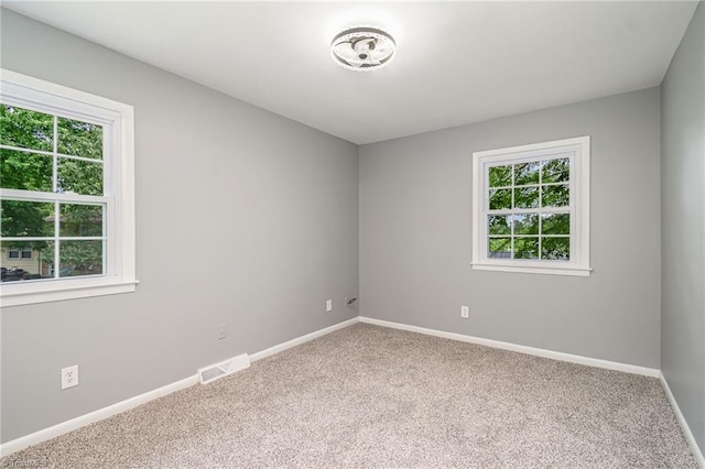 2102 Castlerock Rd, Greensboro, NC 27406 - carpeted spare room with baseboards
