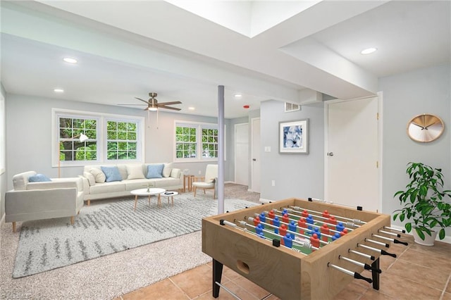 2102 Castlerock Rd, Greensboro, NC 27406 - playroom with a ceiling fan, light tile patterned floors, and recessed lighting