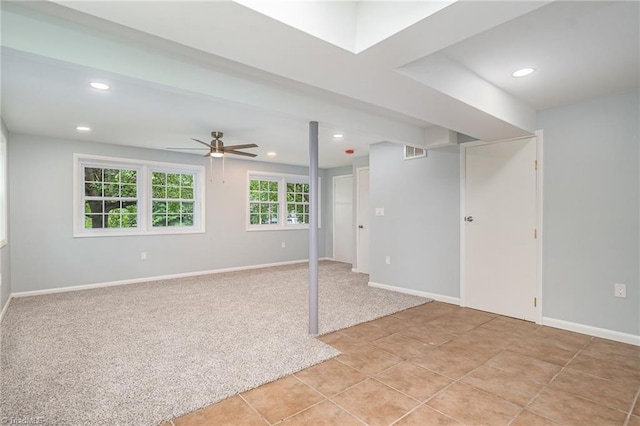 2102 Castlerock Rd, Greensboro, NC 27406 - spare room with ceiling fan, light carpet, recessed lighting, baseboards, and light tile patterned floors