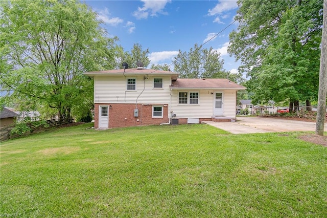 2102 Castlerock Rd, Greensboro, NC 27406 - back of property with a patio