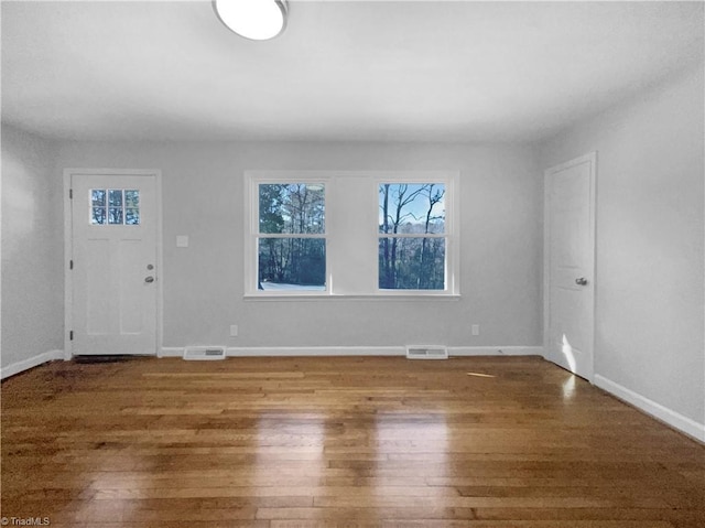 foyer featuring dark hardwood / wood-style floors