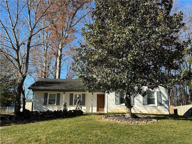 view of front of home with a front lawn