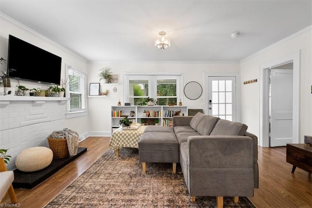 209 Burtner St, Greensboro, NC 27406 - living room with ornamental molding, wood finished floors, and baseboards