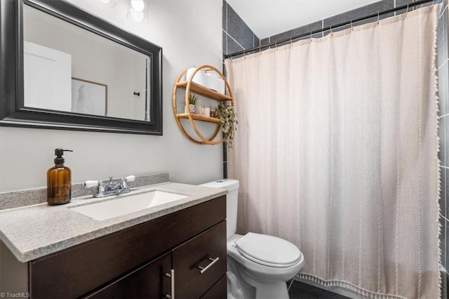 209 Burtner St, Greensboro, NC 27406 - full bathroom featuring toilet, vanity, and a shower with curtain