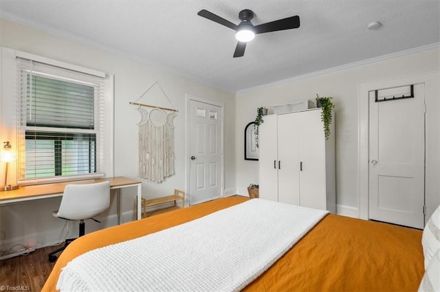 209 Burtner St, Greensboro, NC 27406 - bedroom with ornamental molding, an office area, wood finished floors, and ceiling fan