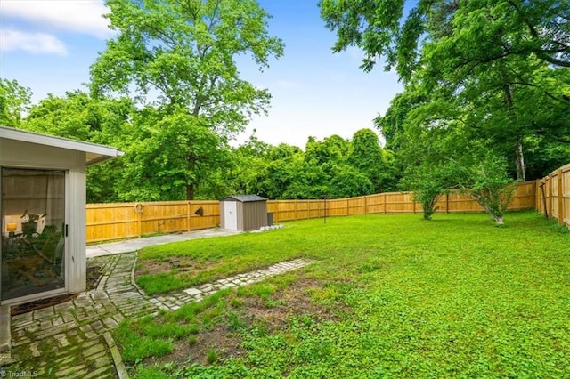209 Burtner St, Greensboro, NC 27406 - view of yard with a storage shed, an outbuilding, and a patio area