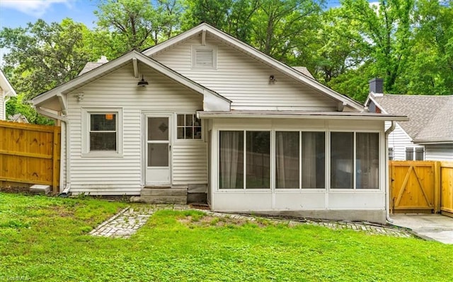 209 Burtner St, Greensboro, NC 27406 - rear view of property with entry steps and a sunroom