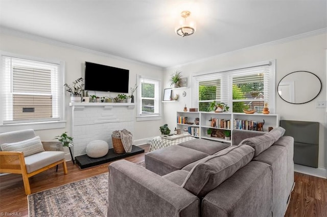 209 Burtner St, Greensboro, NC 27406 - living area with crown molding, wood finished floors, and baseboards
