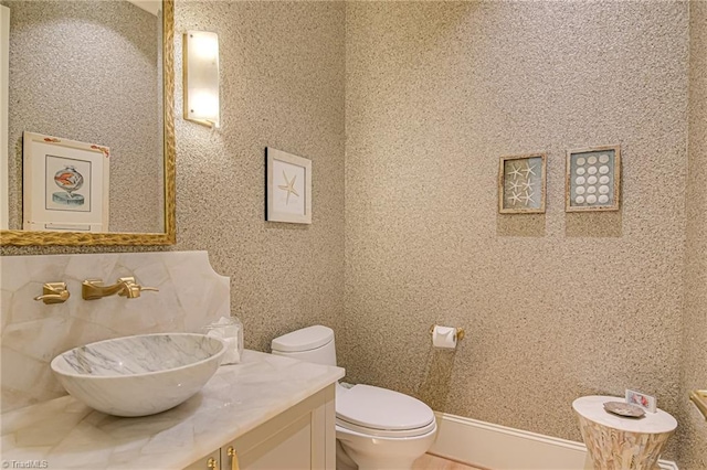2632 Bartram Pl, Winston-Salem, NC 27106 - half bathroom featuring vanity and tile walls