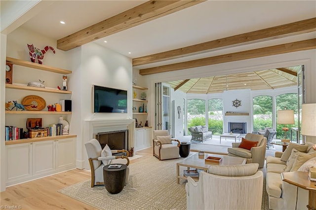 2632 Bartram Pl, Winston-Salem, NC 27106 - living room with a fireplace, beam ceiling, wood finished floors, and built in shelves