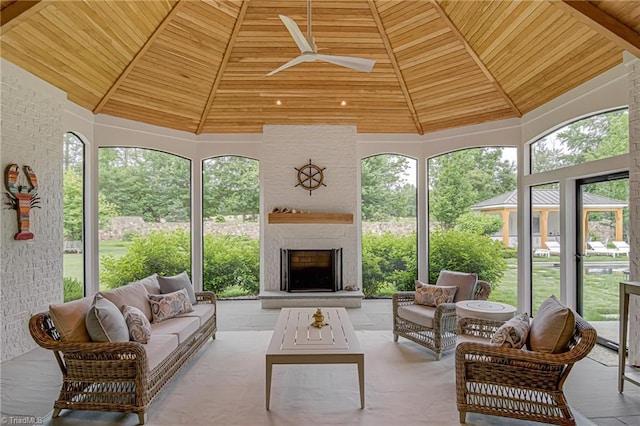 2632 Bartram Pl, Winston-Salem, NC 27106 - sunroom featuring a wood ceiling with exposed beams, a ceiling fan, an outdoor living space with a fireplace, and high vaulted ceiling