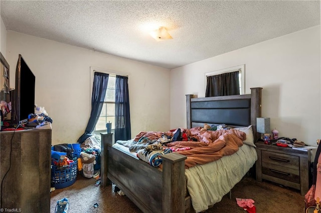 3410 Lambeth St, Winston-Salem, NC 27107 - carpeted bedroom with a textured ceiling
