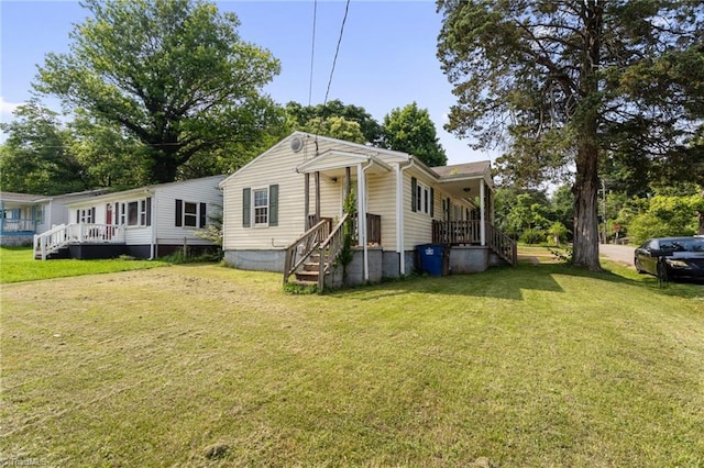 3410 Lambeth St, Winston-Salem, NC 27107 - manufactured / mobile home featuring a front yard and a porch