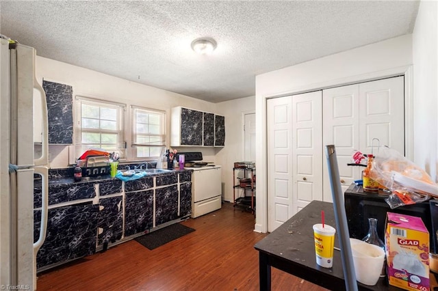3410 Lambeth St, Winston-Salem, NC 27107 - kitchen featuring white appliances, wood finished floors, and a textured ceiling