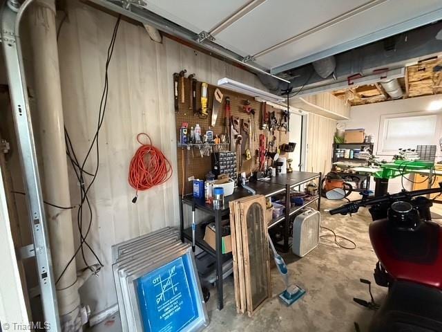 7098 E Fork Rd, High Point, NC 27265 - below grade area with a workshop area and a garage