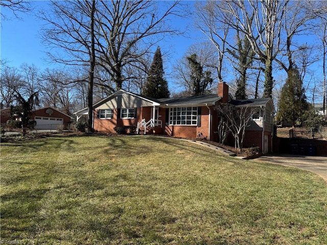 view of front facade featuring a garage and a front yard