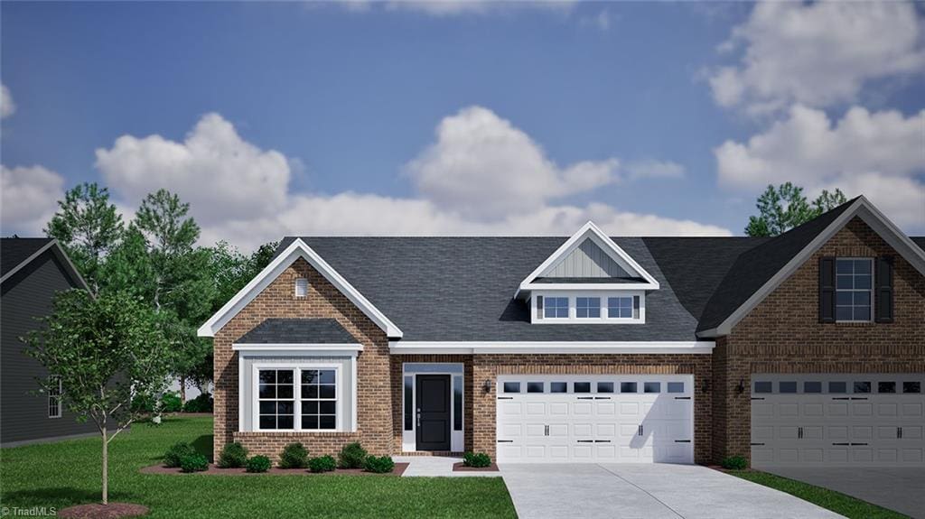 295 Yarrow Dr, Lexington, NC 27295 - view of front facade featuring brick siding, a front yard, and driveway